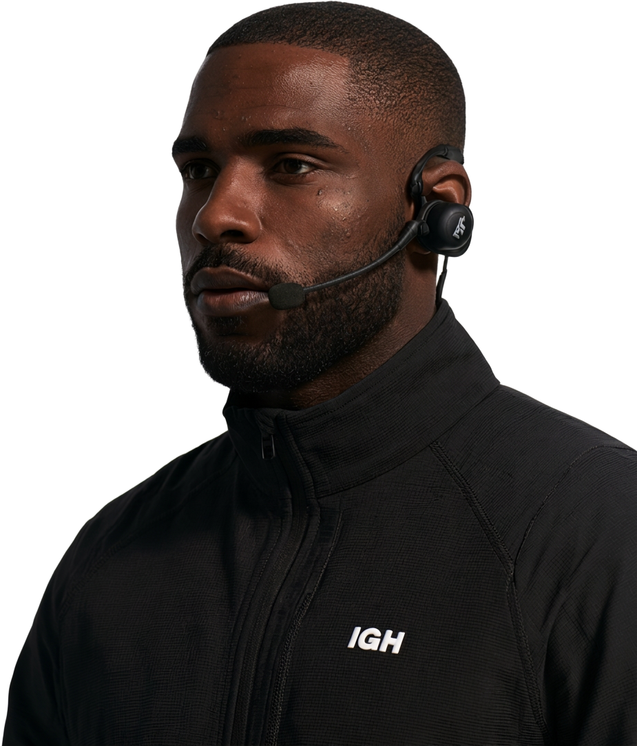 Illustrative IGH agent in a black tech jacket and IGH headset